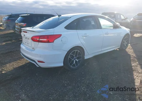 2015 Ford Focus Se z USA, uszkodzony, nr VIN 1FADP3F24FL210122